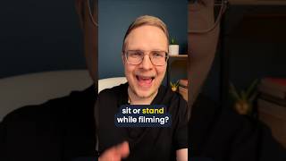 Should You Sit Or Stand While Filming
