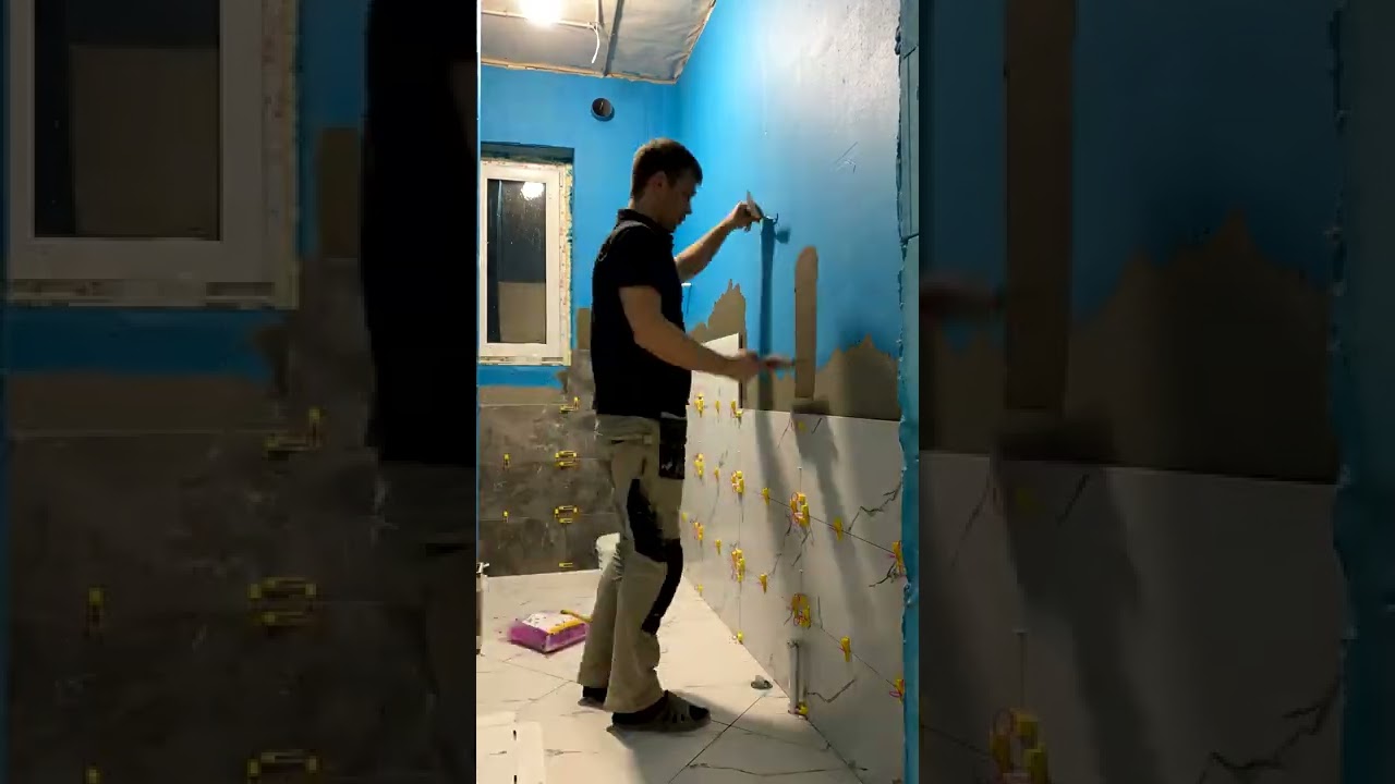 Укладка плитки на стену в ванной 30*60.