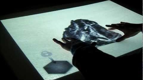 eTable: A haptic elastic table for 3D multi-touch interations