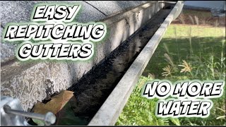 Removing standing water in gutter using hidden hangers