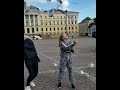 Sofya Plotnikova feeding pigeons in Finland