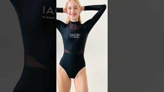 Девушка в черном купальном костюме IACO #серфинг #мода #спорт #тренд #фитнес