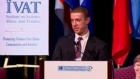 Dr. Casey Taft receiving the 2009 Linda Saltzman M...