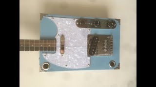 4 string Telecaster Boxcaster cigar box guitar - The English Guitar Company - Dogleg Steve playing