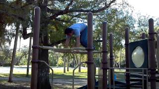 Handstand on monkey bars.