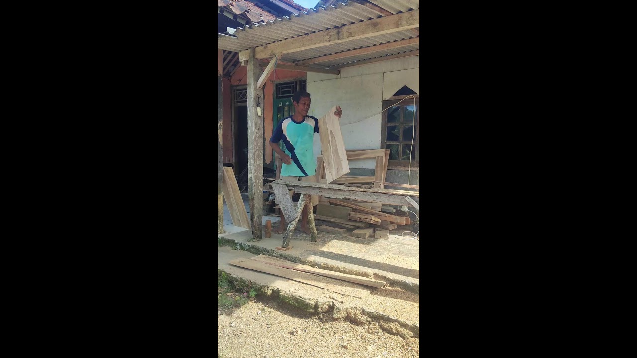 Skillful Craftsman Planing Wood for Farm Furniture 