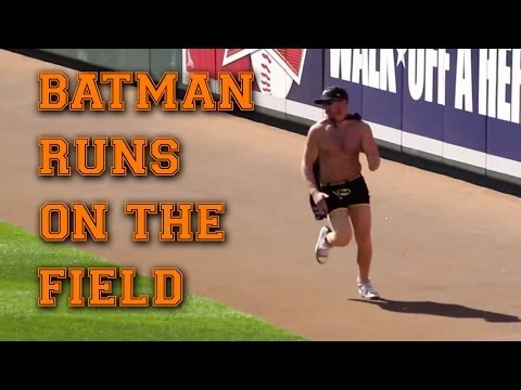 A fan, dressed in a cape and Batman boxers, runs onto the field at the Baltimore Orioles opener. My Twitter: http://twitter.com/#!/kyle_mace WashPost: http:/...