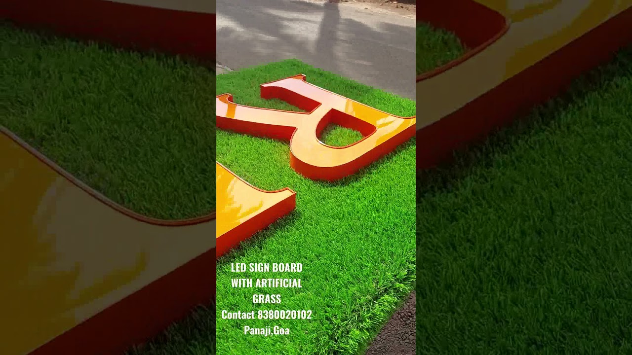 LED Sign board with artificial grass background
