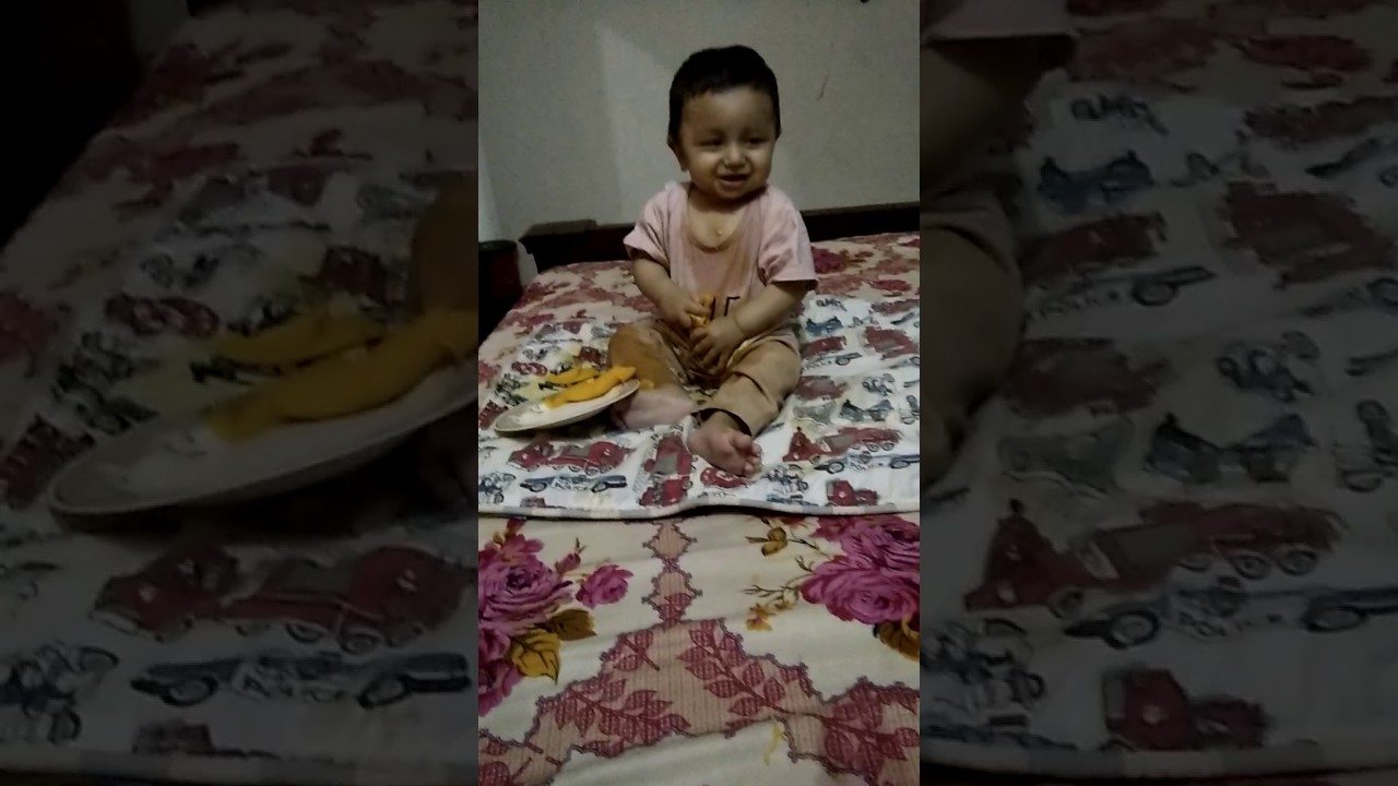 Cute baby eating mangoes YouTube