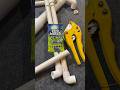 Opening a Dead World pack with ratcheting PVC pipe cutter