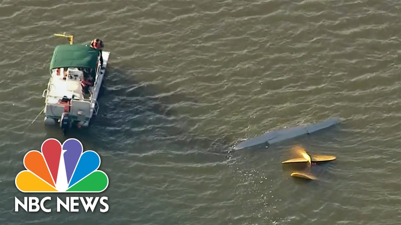 Four killed in two-plane collision over Florida lake Four killed in two-plane collision over Florida lake