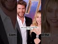 Liam Hemsworth tells Miley Cyrus to behave on red carpet #liamhemsworth #mileycyrus #flowers