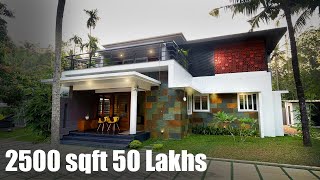 നടു മുറ്റം വീടിനു പുറകിലോ !കണ്ടാൽ ഞെട്ടും  2500 sqft 50 ലക്ഷം രൂപക്ക്‌ നിർമിച്ച സുന്ദര ഭവനം..