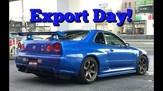 Driving Nissan Skyline GT-R R34 to the port.