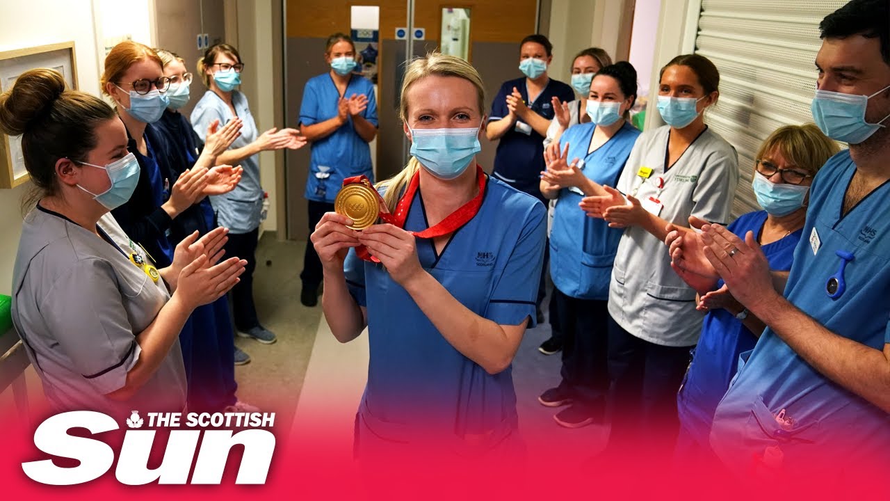 Olympic curling gold-medallist Vicky Wright returns to work with cheers from fellow nurses