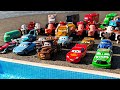 Disney Pixar Cars falling into deep pool, Lightning McQueen, Tow Mater, Mack, Sally, Francesco