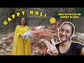 Holi celebration with colours and family  festival  happy holi