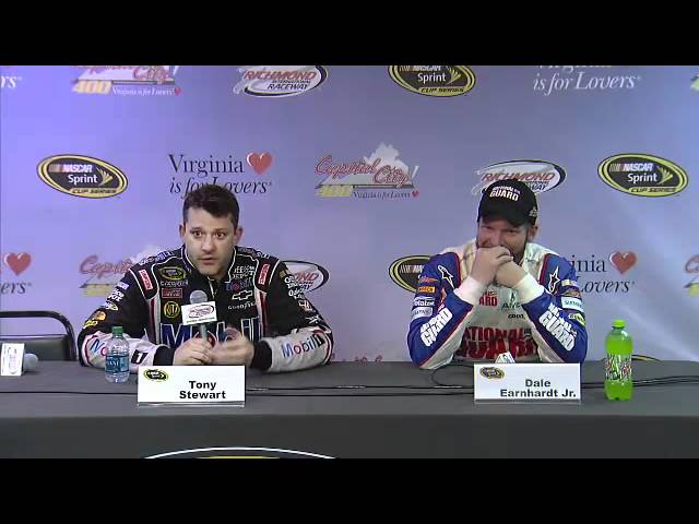 Dale Earnhardt Jr. tries not to laugh as Tony Stewart insults reporter