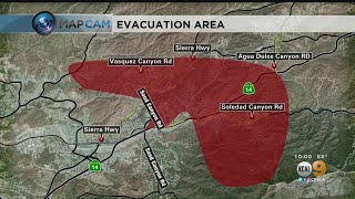 Those who live in the area east of sand canyon — south sierra
highway to soledad were still under mandatory evacuation as friday
night.