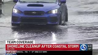 As coastal storm moves out, residents now cleaning up damage
