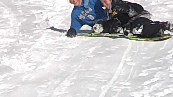 Jeffrey and Kara sledding together