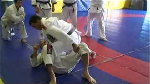 Fabricio Werdum demonstrates a choke.