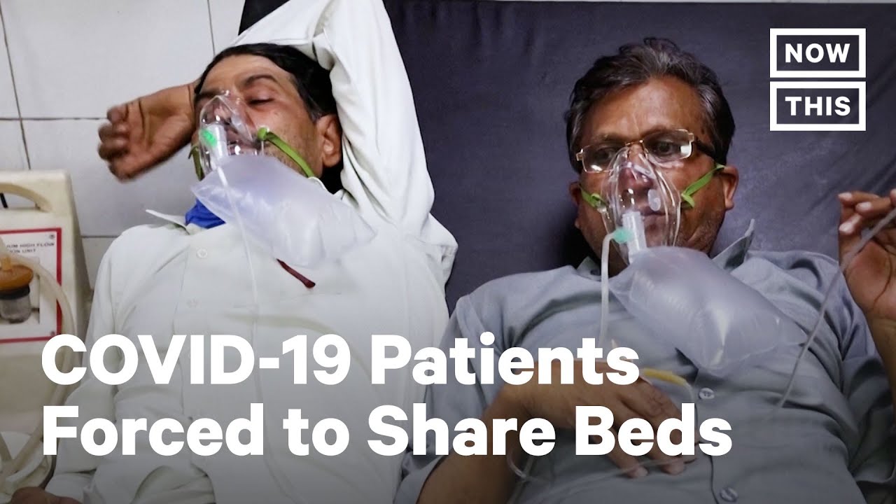 COVID-19 Patients Share Beds Amid Spike in India