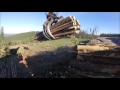 John Deere 2454D Loading a logging truck