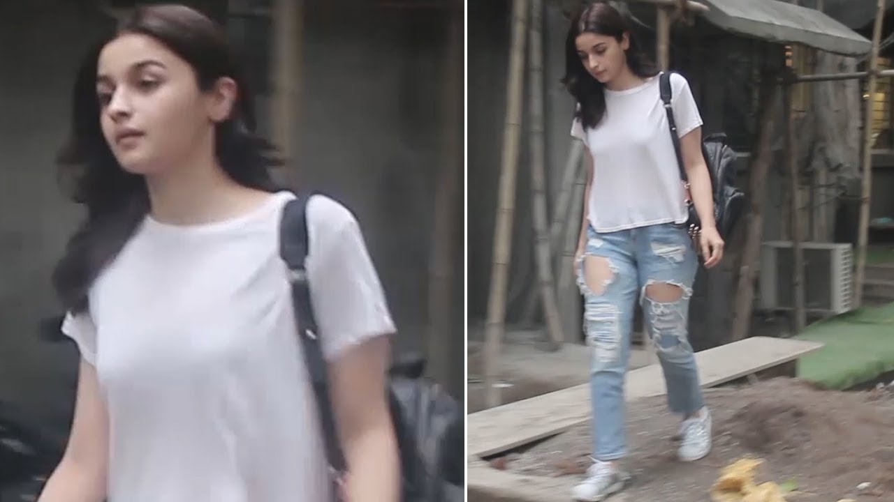 white top and ripped jeans