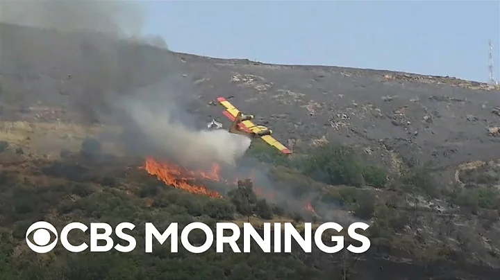 Extreme heat, wildfires linked to climate change cause chaos across southern Europe and beyond