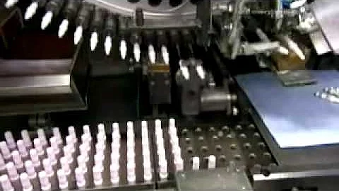Como é feito o vela de ignição?