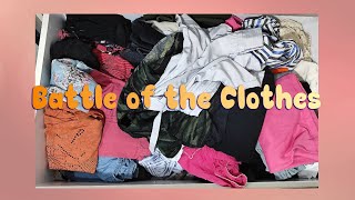 "Battle of the Clothes: To Fold or To Iron, That Is the Question!"
