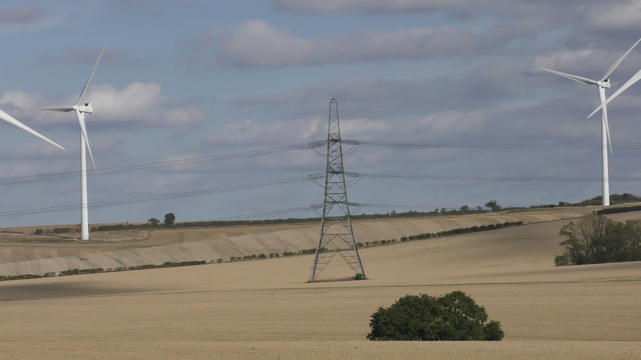 walking pez Electricity Pylon surrounded by Wind turbines Fleam Dyke Historic Earthworks 15sep19 340p