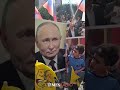 Russian flags and Kim Jong Un posters at Palestinian protest in West Bank