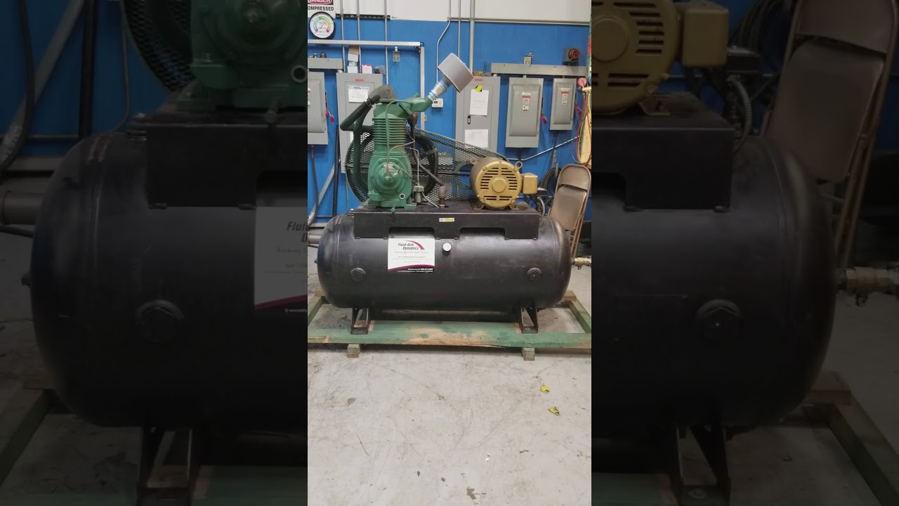 Used 15 HP Champion Reciprocating Piston Air Compressor 200 Volt
