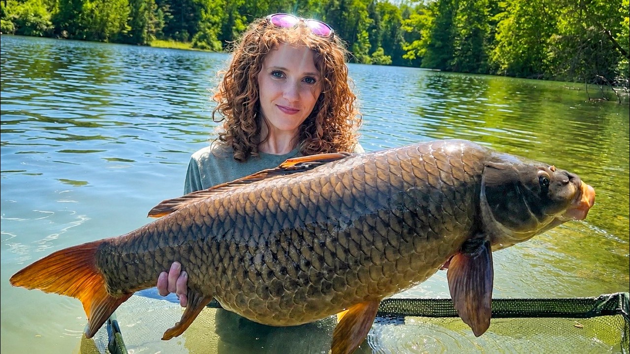 She Caught the Biggest Fish of Her Life And Then Swam with it
