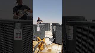Trane outdoor clean with pressure washer