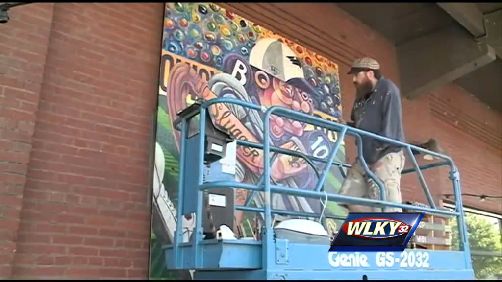 Murals created by Louisville artist go up at Slugger Field
