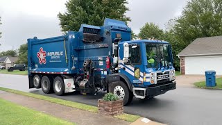 Various Blue Garbage Trucks in Action