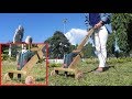 How to make a lawn mover/grass cutter from a drill machine .