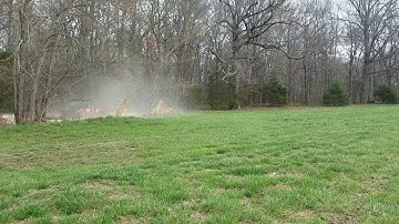 Polaris RZR 570 skips across pond