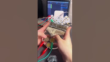 Valent Ko is playing music using 3 coins and attached its on his kalimba #playtron #playtronica