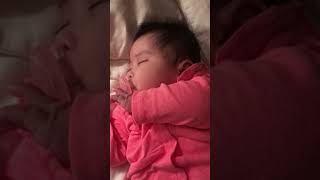 Sleeping daughter with pacifier