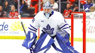 Maple Leafs goalie Anthony Stolarz hospitalized after puck hits throat in freak warmup incident.