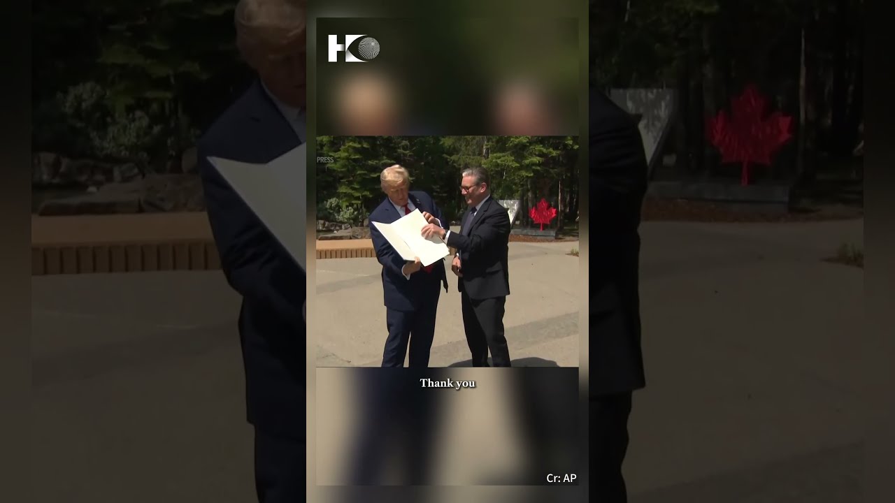 Trump Drops Papers Of US UK Trade Deal At G7
