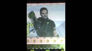 Stephen Amell arrives on stage at Comic-Con in his new Green Arrow costume