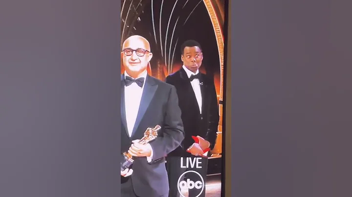 Why Chris Rock acting like this that slapped? by J...
