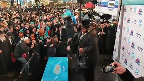 Thumbnail of Gad elbaz and Nissim hashem melech 2.0 in time  Square with CTEEN