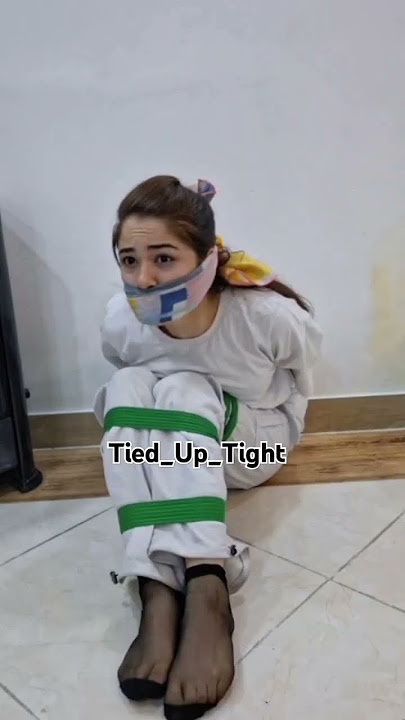 Imagine an Iranian girl in a critical situation, hands and feet bound, struggling to escape. #tiedup