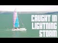 CAUGHT IN LIGHTNING STORM WHILE SAILING | MICROBURST CAPSIZES CATAMARAN